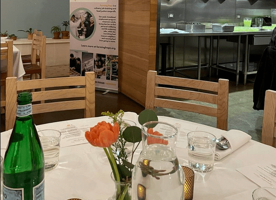 farming hope dinner table set for event